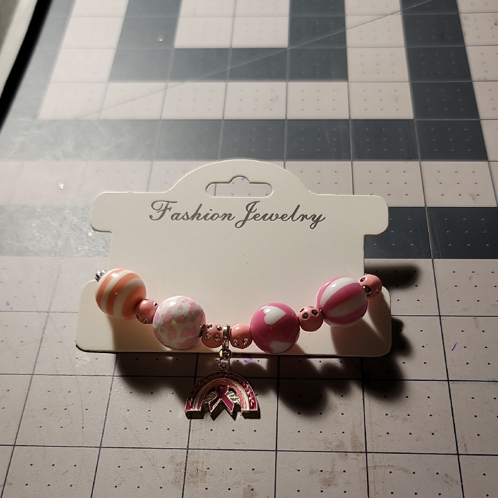 Pink Beaded Bracelet with Rainbow Charm
